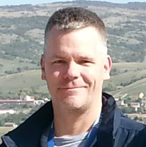 Headshot of James Quirk